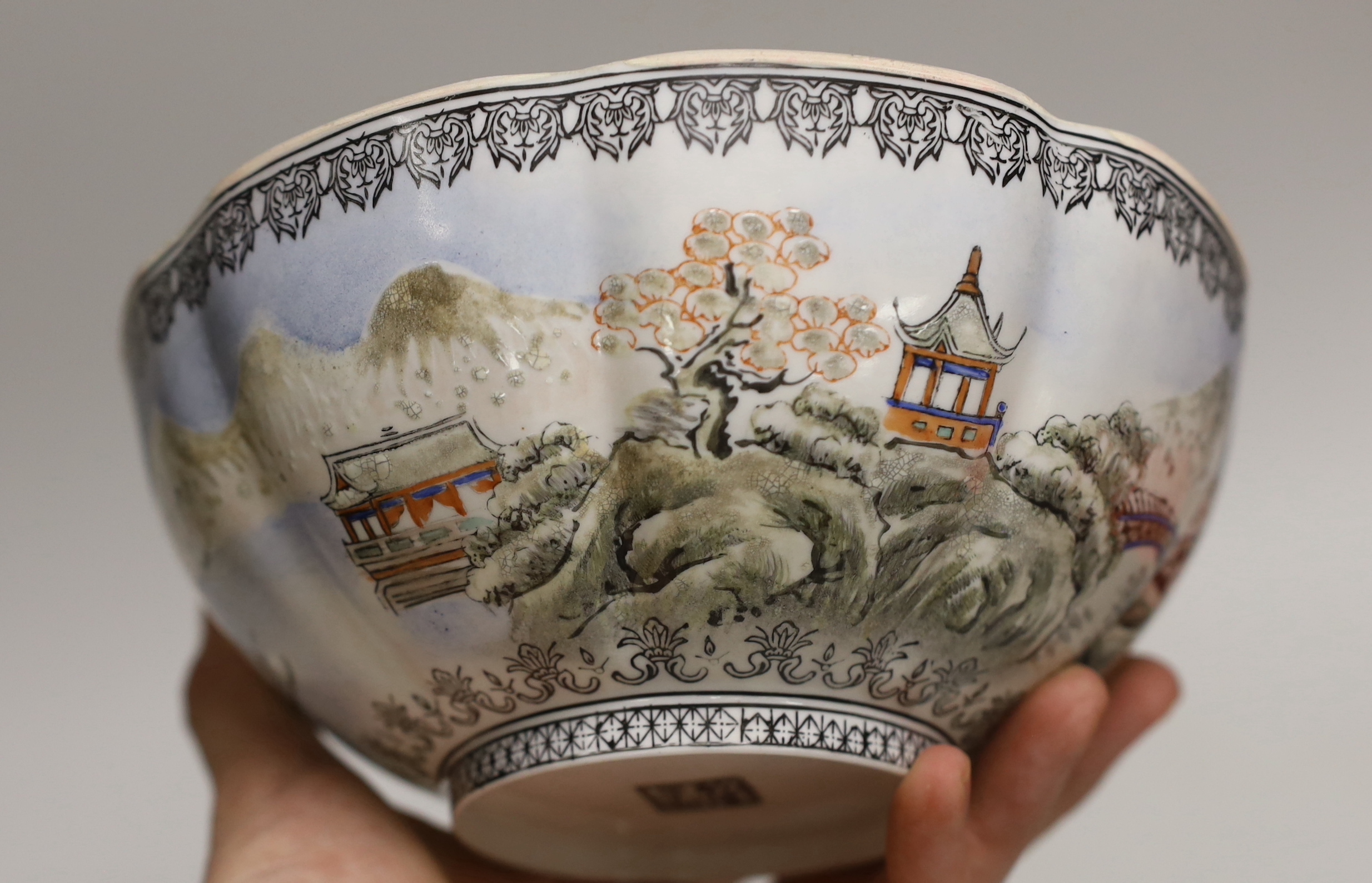 A Chinese eggshell bowl in fitted box, decorated with a mountainous landscape, 18cm in diameter